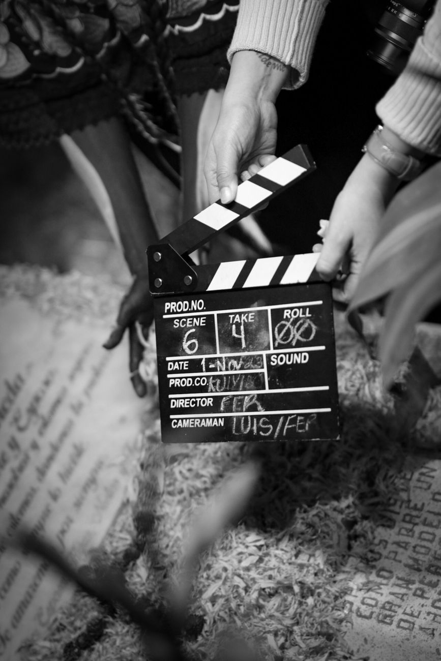 Clapboard on active filming set